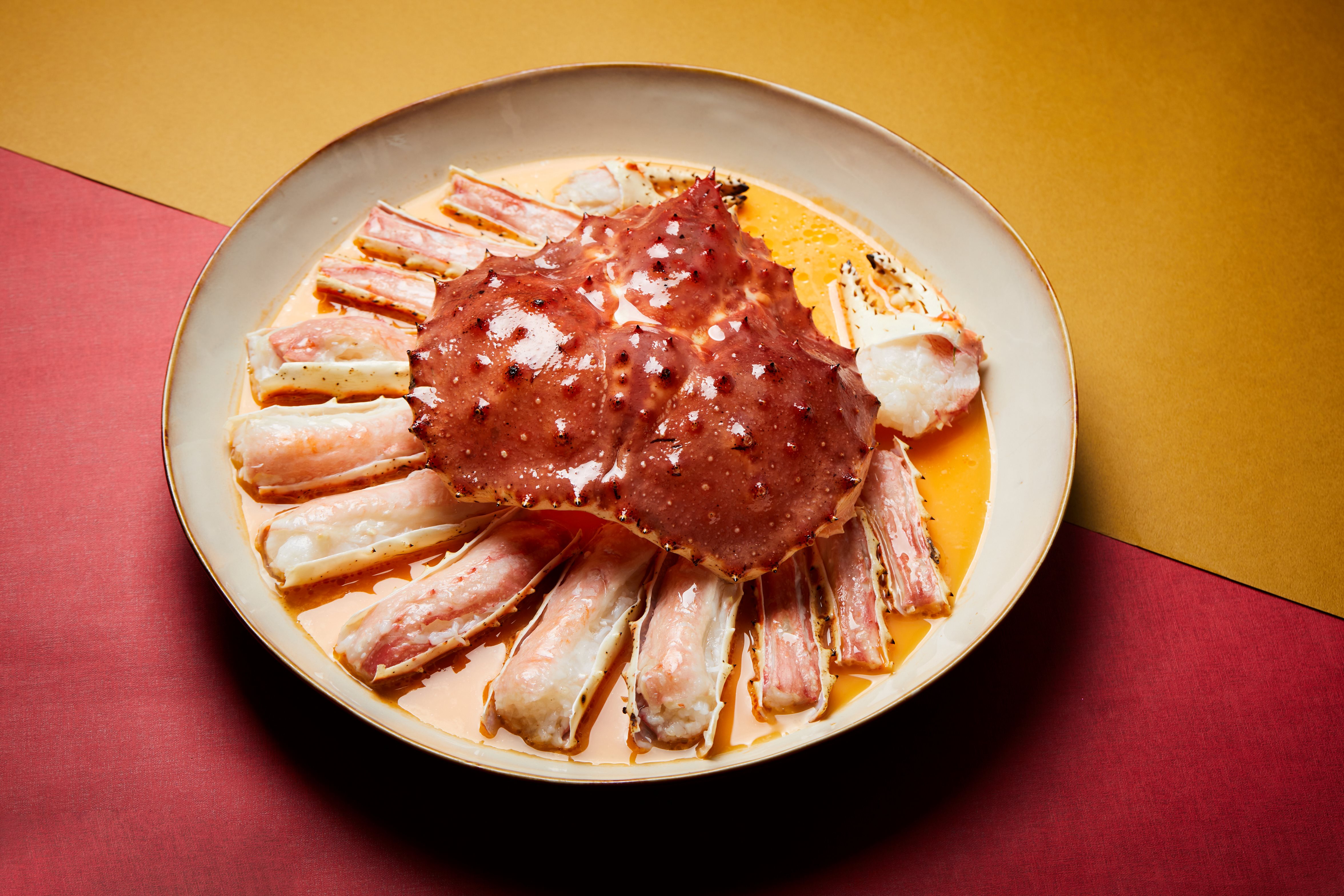 A lobster in a bowl Description automatically generated